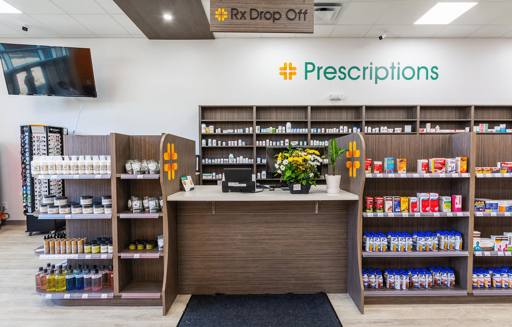 Pharmacy prescription drop-off counter and retail shelves